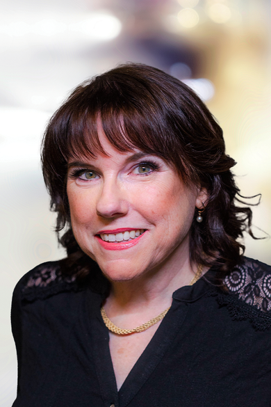 Portrait of Stacey Longo, REALTOR®.